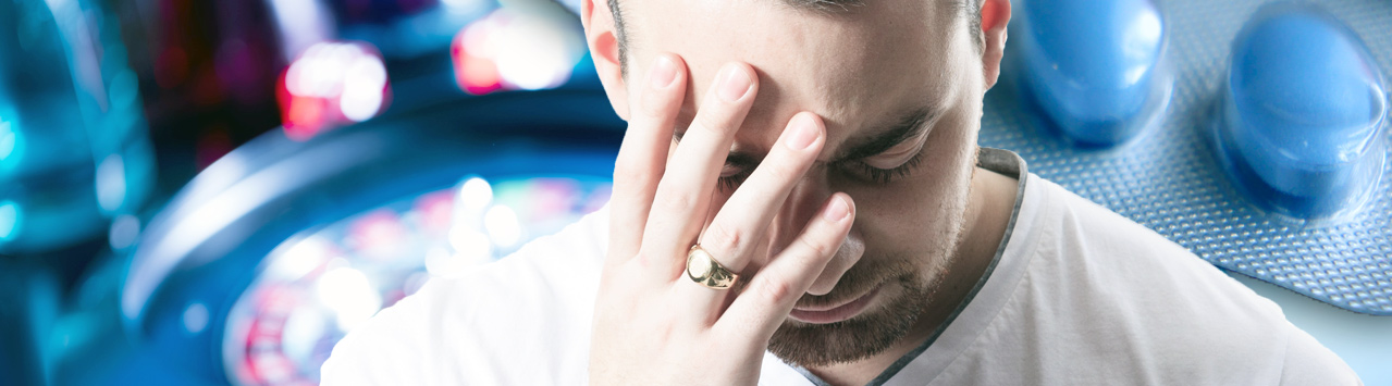 Tensed man holding head